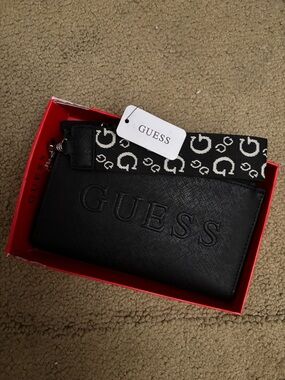 GUESS Black Embossed Logo Wristlet with Black & White Monogram Strap
